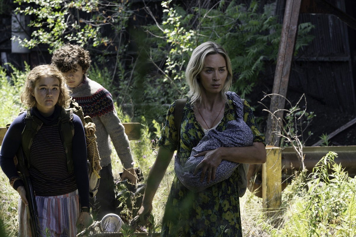 “L-r, Regan (Millicent Simmonds), Marcus (Noah Jupe) and Evelyn (Emily Blunt) brave the unknown in A Quiet Place Part II.”
